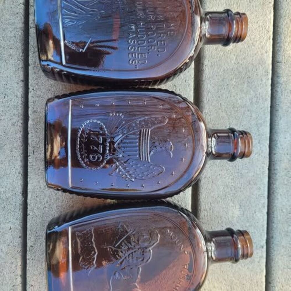Vintage Americana Bicentennial Log Cabin amber bottles (3 in set)